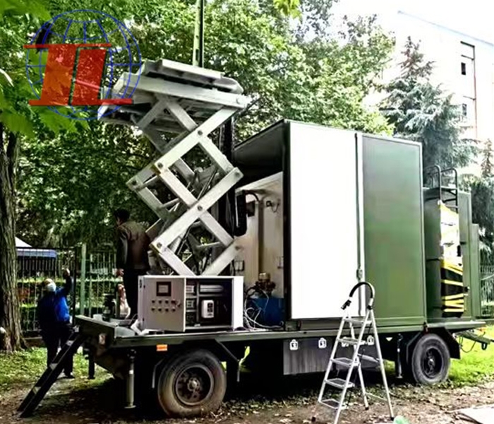 Elevating and rotating satellite monitoring vehicle